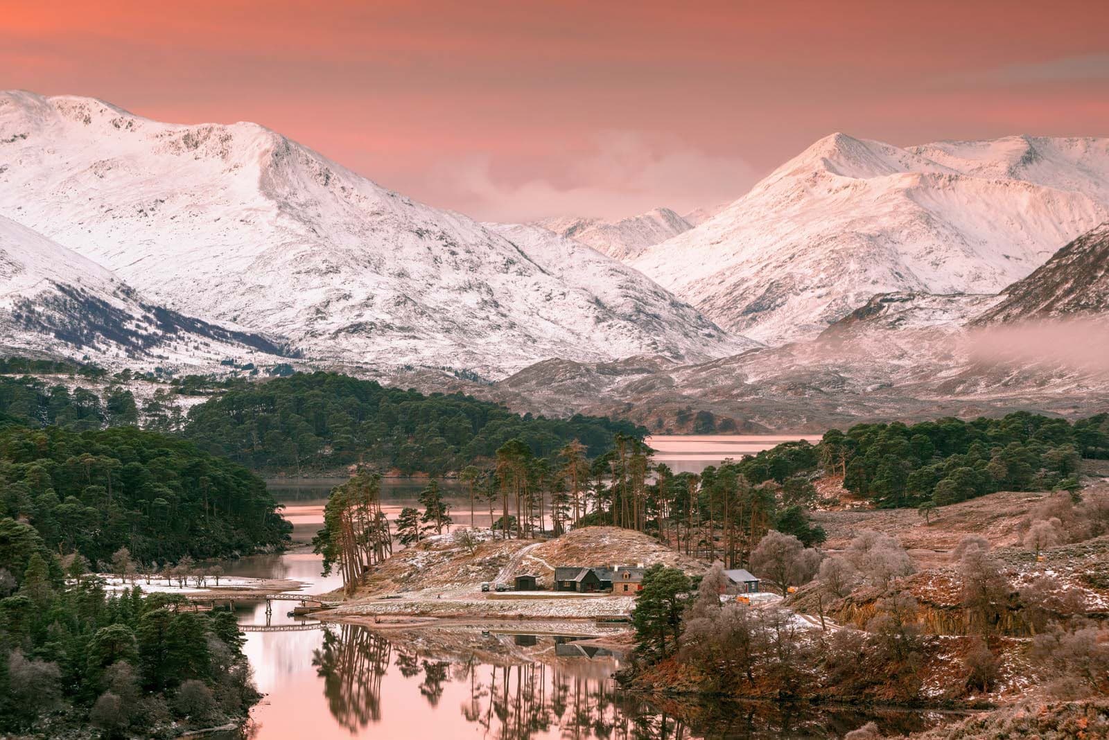 Snow-capped mountains at sunset